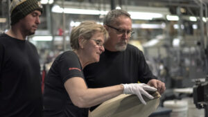 SupremeX employees at envelope manufacturing plant